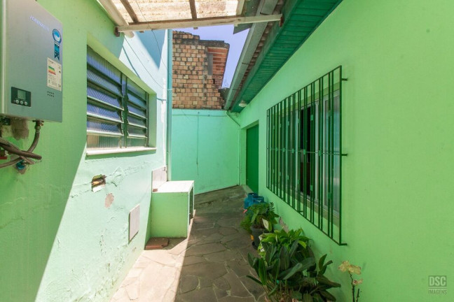 Imagem Casa com 3 Quartos à Venda, 216 m² em Vila Nova - Porto Alegre