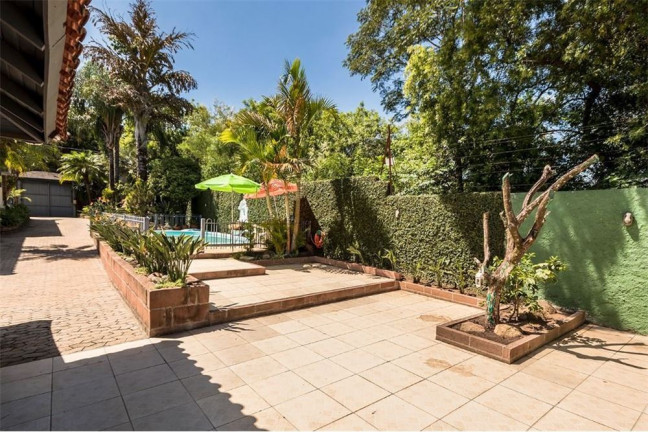 Imagem Casa com 4 Quartos à Venda, 525 m² em Jardim Sabará - Porto Alegre Imagem Casa com 4 Quartos à Venda, 525 m² em Jardim Sabará - Porto Alegre