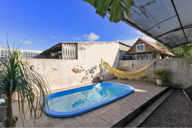 Imagem Casa com 2 Quartos à Venda, em Hípica - Porto Alegre Imagem Casa com 2 Quartos à Venda, em Hípica - Porto Alegre