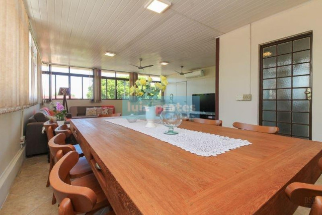 Imagem Casa com 7 Quartos à Venda, 330 m² em Nonoai - Porto Alegre