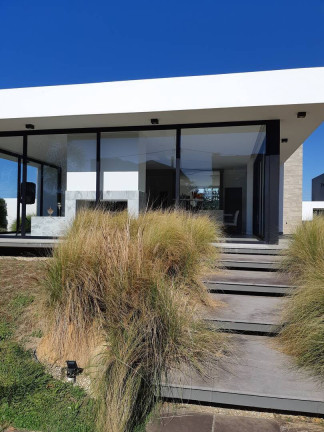Imagem Casa com 4 Quartos à Venda, 204 m² em Marina - Xangri-lá Imagem Casa com 4 Quartos à Venda, 204 m² em Marina - Xangri-lá