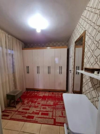 Imagem Casa com 4 Quartos à Venda, 150 m² em Novo Mundo - Curitiba Imagem Casa com 4 Quartos à Venda, 150 m² em Novo Mundo - Curitiba