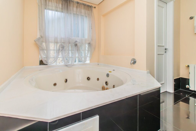 Imagem Casa de Condomínio com 4 Quartos à Venda, 387 m²