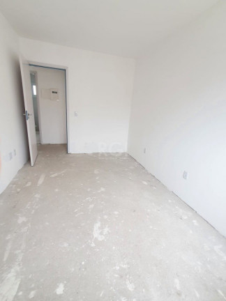 Imagem Casa de Condomínio com 2 Quartos à Venda, 64 m² em Vila Nova - Porto Alegre