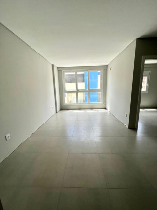 Imagem Apartamento com 2 Quartos à Venda, 59 m² em Centro - Capao Da Canoa