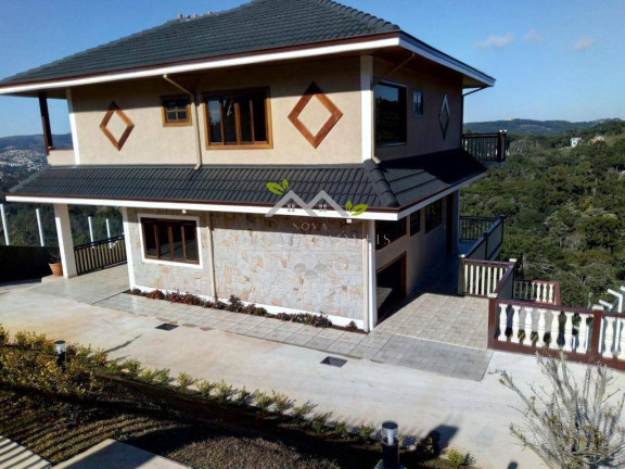Imagem Casa com 4 Quartos à Venda, 240 m² em Vila Natal - Campos Do Jordão