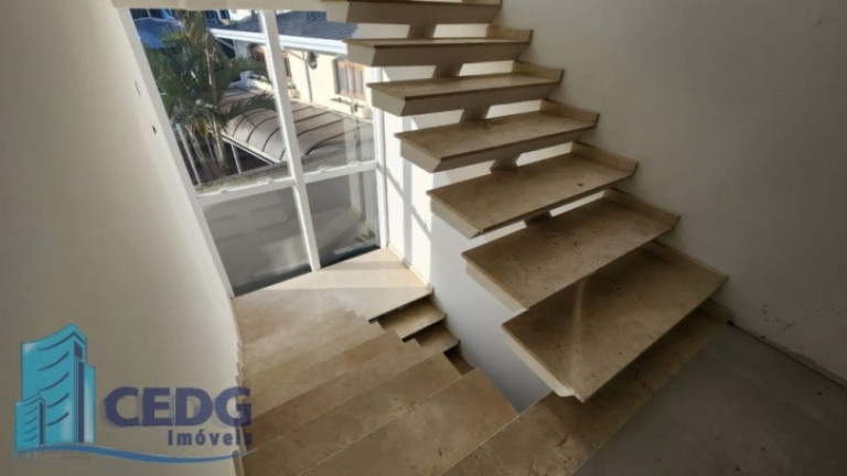 Imagem Casa de Condomínio com 3 Quartos à Venda, 312 m² em Bacacheri - Curitiba