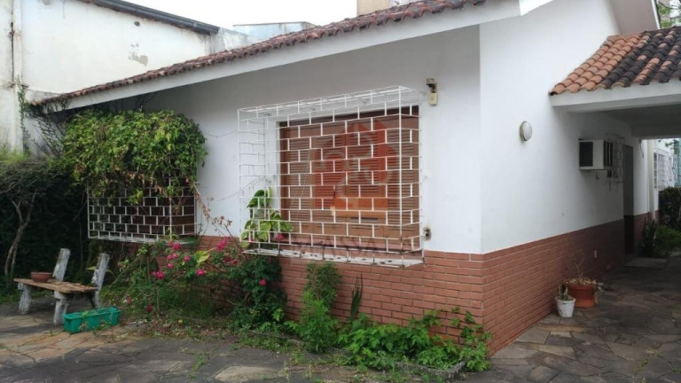 Imagem Casa com 3 Quartos à Venda, 410 m² em Menino Deus - Porto Alegre Imagem Casa com 3 Quartos à Venda, 410 m² em Menino Deus - Porto Alegre