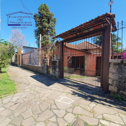 Imagem Casa com 4 Quartos à Venda, 106 m² em Santa Tereza - Porto Alegre Imagem Casa com 4 Quartos à Venda, 106 m² em Santa Tereza - Porto Alegre