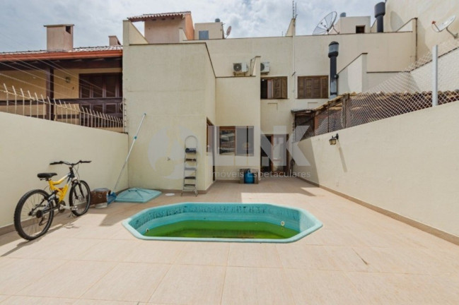 Imagem Casa com 3 Quartos à Venda, 231 m² em Jardim Itu - Porto Alegre