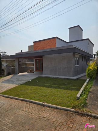 Imagem Casa de Condomínio com 4 Quartos à Venda, 220 m² em Cachoeira Do Bom Jesus - Florianópolis