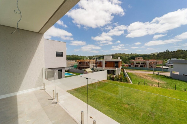 Imagem Casa de Condomínio com 3 Quartos à Venda, 300 m² em Vila Nova - Porto Alegre