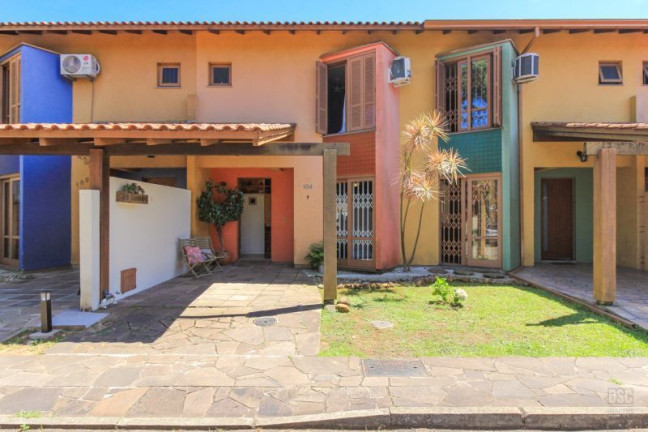 Imagem Casa com 4 Quartos à Venda, 117 m² em Cavalhada - Porto Alegre