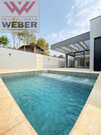 Imagem Casa de Condomínio com 4 Quartos à Venda, 435 m² em Alphaville Nova Esplanada - Votorantim
