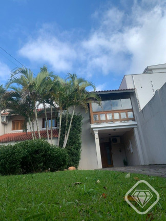 Imagem Casa de Condomínio com 4 Quartos à Venda,  em Ipanema - Porto Alegre