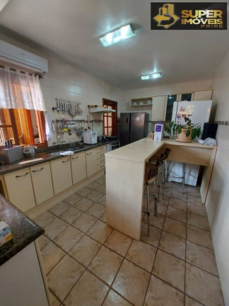 Imagem Casa com 4 Quartos à Venda, 360 m² em Centro - Pelotas Imagem Casa com 4 Quartos à Venda, 360 m² em Centro - Pelotas