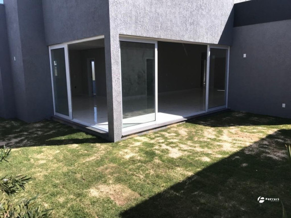 Imagem Casa de Condomínio com 4 Quartos à Venda, 200 m² em Dubai - Capão Da Canoa