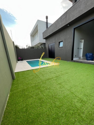 Imagem Casa de Condomínio com 4 Quartos à Venda, 166 m² em Centro - Xangri-la