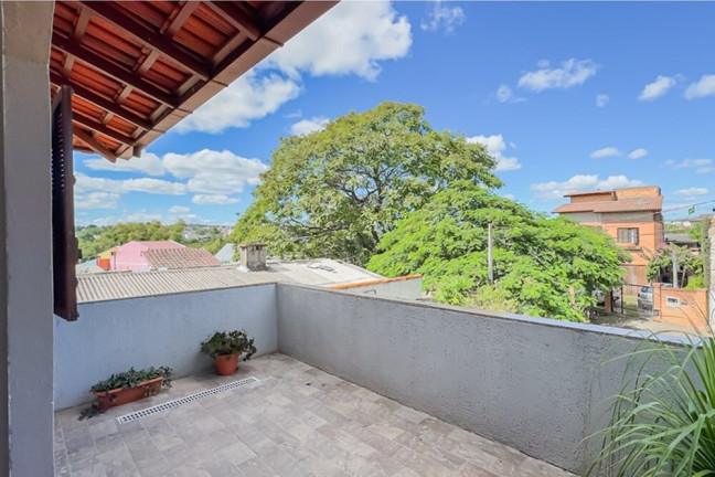 Imagem Casa com 5 Quartos à Venda, 208 m² em Parque Dos Maias - Porto Alegre