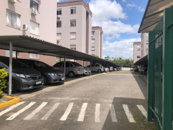 Imagem Apartamento com 2 Quartos à Venda, 63 m² em Protasio - Porto Alegre