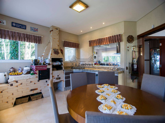 Imagem Casa com 4 Quartos à Venda, 442 m² em Vila Natal - Campos Do Jordão