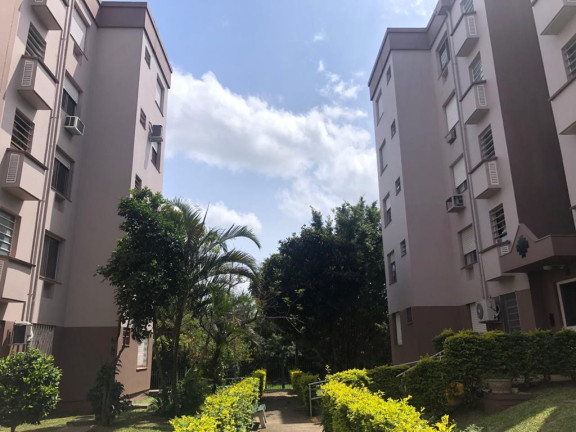 Imagem Apartamento com 2 Quartos à Venda, 63 m² em Protasio - Porto Alegre