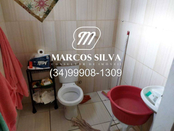 Imagem Casa com 4 Quartos à Venda, 300 m² em Segismundo Pereira - Uberlândia