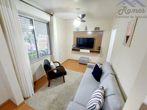 Imagem Imóvel com 3 Quartos à Venda, 62 m² em Vila Nova - Porto Alegre