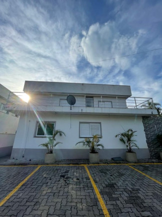 Imagem Sobrado com 3 Quartos à Venda, 304 m² em Tabatinga - Caraguatatuba