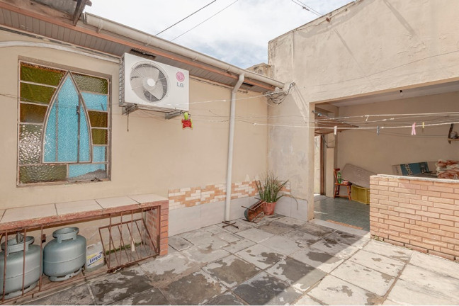 Imagem Casa com 4 Quartos à Venda, 170 m² em Vila Nova - Porto Alegre