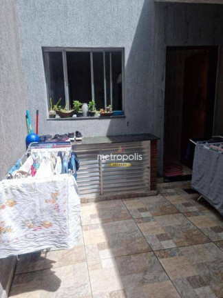 Imagem Sobrado com 3 Quartos à Venda, 112 m² em Cidade São Jorge - Santo André