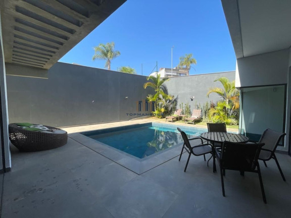 Imagem Casa de Condomínio com 5 Quartos à Venda, 472 m² em Alphaville - Vespasiano