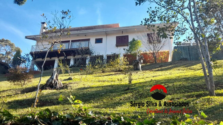 Imagem Casa de Condomínio com 4 Quartos à Venda, 2 m² em Vale Encantado - Campos Do Jordão