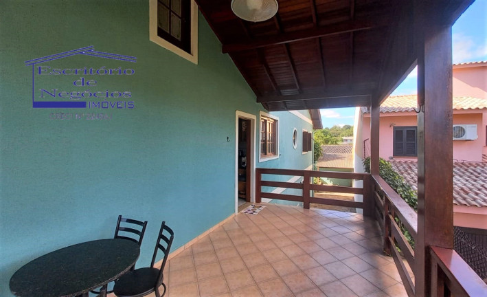 Imagem Casa com 4 Quartos à Venda, 260 m² em Vila Nova - Porto Alegre