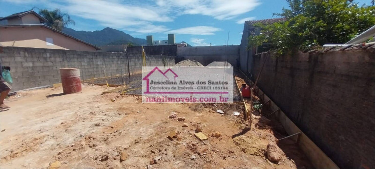 Imagem Casa com 3 Quartos à Venda, 250 m² em Massaguaçu - Caraguatatuba