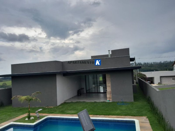 Imagem Casa de Condomínio com 4 Quartos à Venda, 257 m²