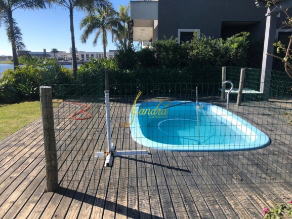 Imagem Casa de Condomínio com 4 Quartos à Venda, 309 m² em Centro - Xangri-la