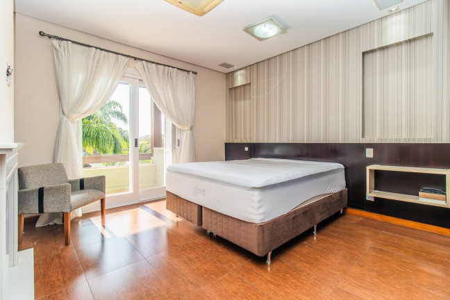 Imagem Casa de Condomínio com 4 Quartos à Venda, 387 m²
