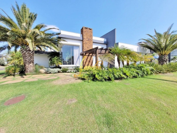 Imagem Casa de Condomínio com 4 Quartos à Venda, 210 m² em Centro - Xangri-la