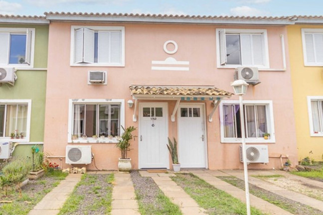 Imagem Casa de Condomínio com 3 Quartos à Venda, 72 m² em Sarandi - Porto Alegre