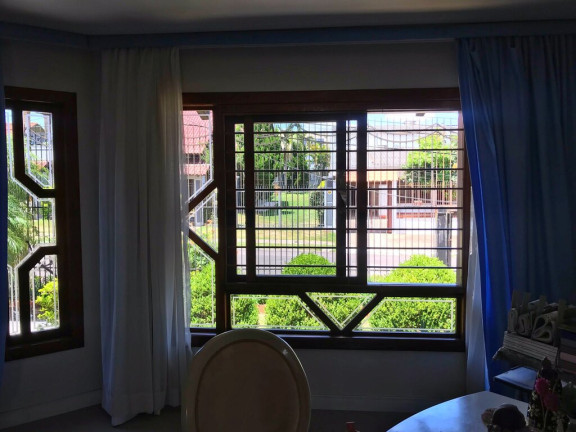 Imagem Casa com 3 Quartos à Venda, 558 m² em Igara - Canoas
