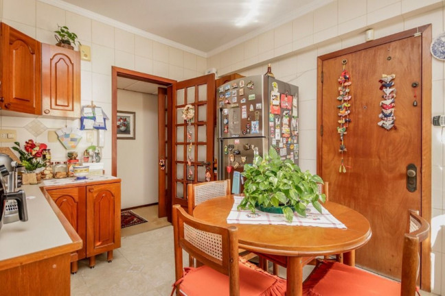 Imagem Imóvel com 3 Quartos à Venda, 109 m² em Auxiliadora - Porto Alegre