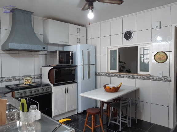 Imagem Casa com 3 Quartos à Venda, 260 m² em Ipanema - Porto Alegre