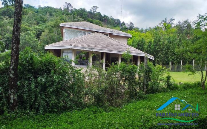 Imagem Casa de Condomínio com 4 Quartos à Venda, 560 m² em Centro - Paraisópolis