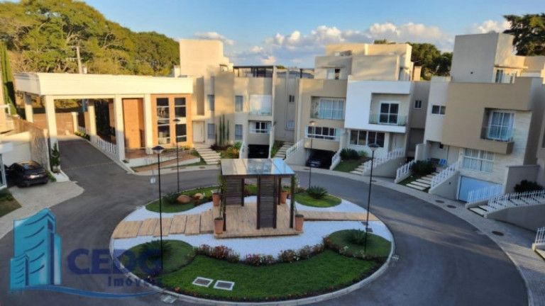 Imagem Casa de Condomínio com 3 Quartos à Venda, 312 m² em Bacacheri - Curitiba