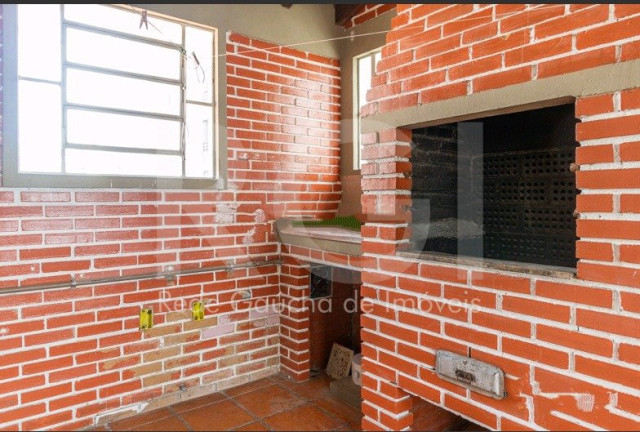 Imagem Casa com 5 Quartos à Venda, 299 m² em Menino Deus - Porto Alegre Imagem Casa com 5 Quartos à Venda, 299 m² em Menino Deus - Porto Alegre