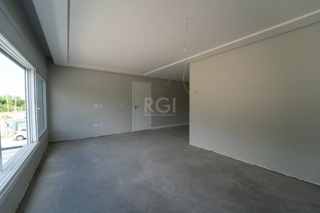 Imagem Casa de Condomínio com 3 Quartos à Venda, 300 m² em Vila Nova - Porto Alegre