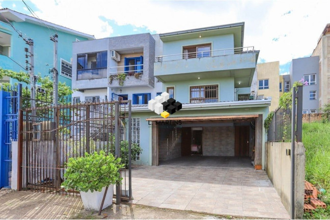 Imagem Casa com 3 Quartos à Venda, 185 m² em Hípica - Porto Alegre Imagem Casa com 3 Quartos à Venda, 185 m² em Hípica - Porto Alegre