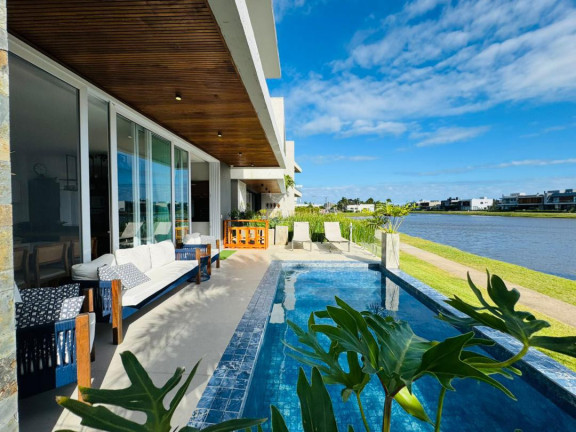 Imagem Casa com 4 Quartos à Venda, 236 m² em Condominio Blue Xangri-la - Xangri-lá Imagem Casa com 4 Quartos à Venda, 236 m² em Condominio Blue Xangri-la - Xangri-lá