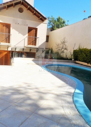 Imagem Casa com 4 Quartos à Venda, 350 m² em Vila Assunção - Porto Alegre